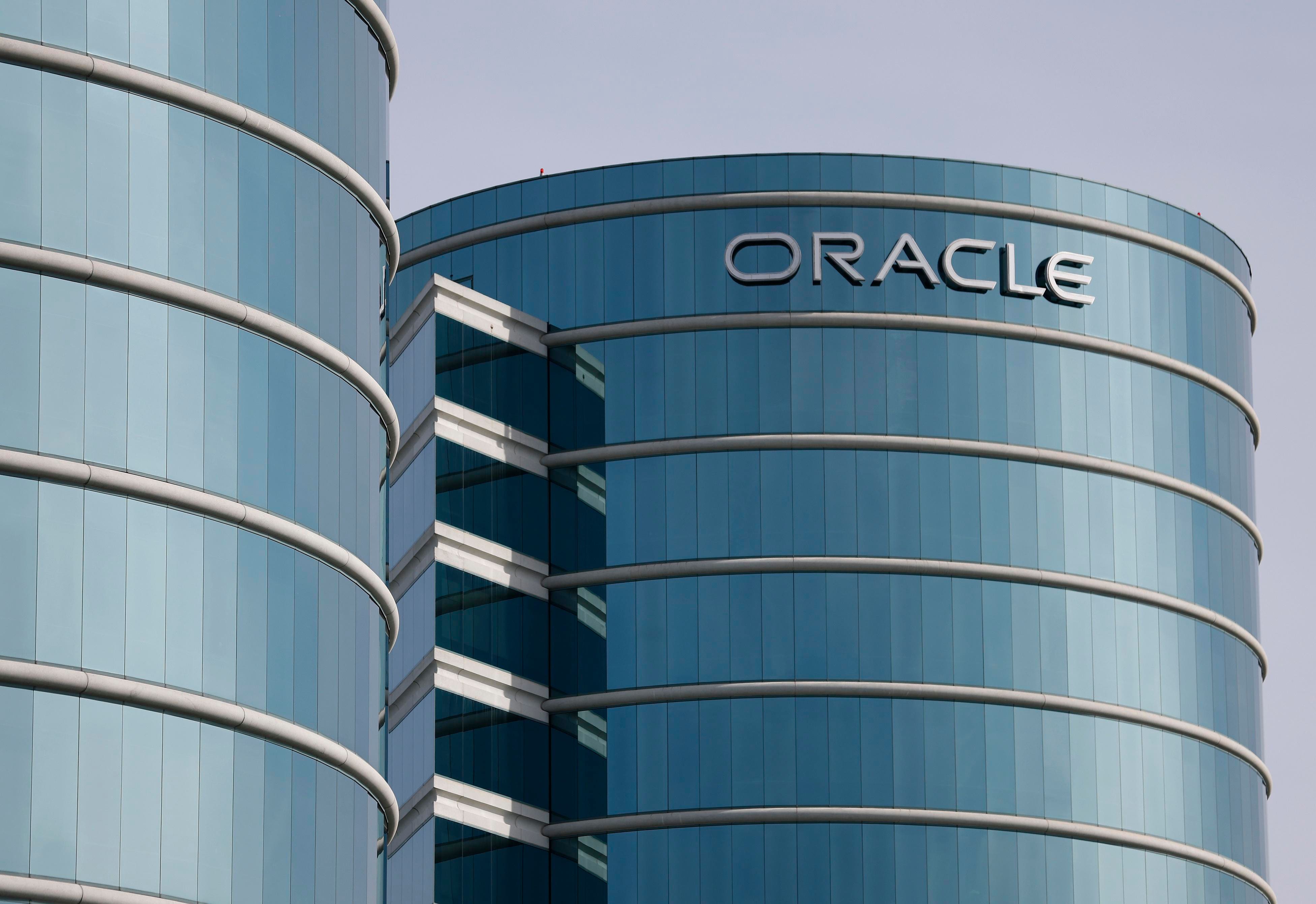 AI Spending Strains Lead to Tech Layoffs: Oracle's Big Gamble